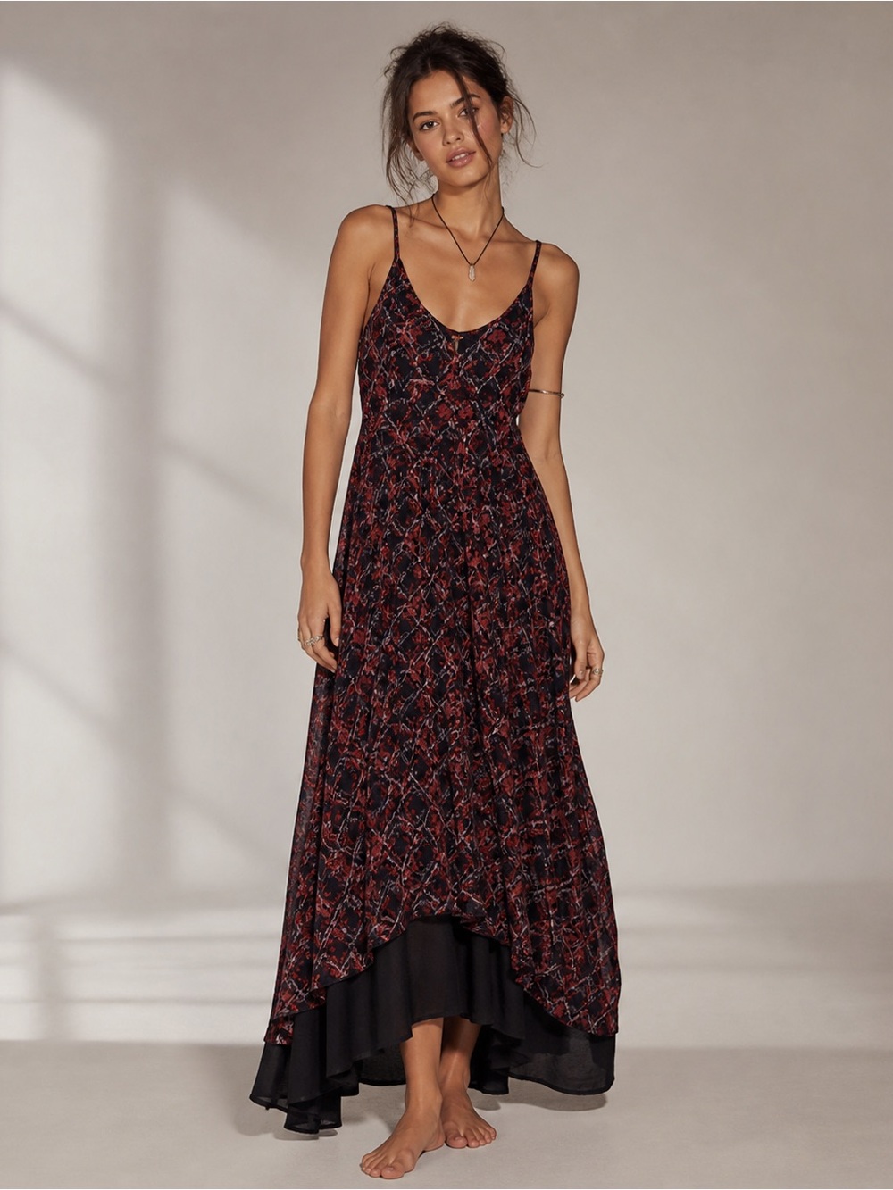 Free people Cute strap flair dress . Bottom tapers like a train black red small
